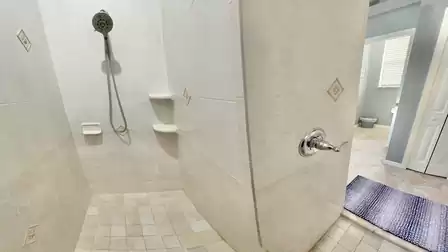 A walk-in shower is also part of the master bathroom