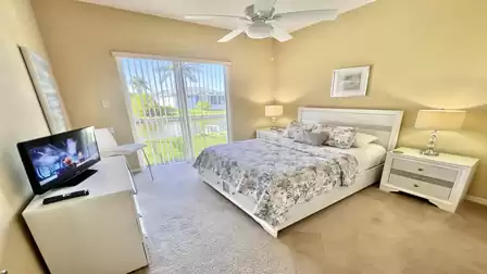 Sliders open from the second bedroom to the patio