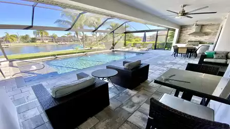 Relaxation time with view of the pool and palm trees