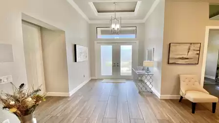 The foyer has a high ceiling