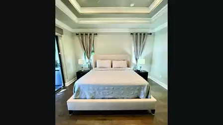 The master bedroom features a King size bed