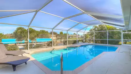 Serene views of the canal from the pool area