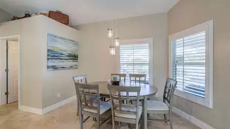 The dining room offers pleasant views of the pool area