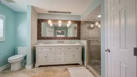 The directly attached master bath offers a shower