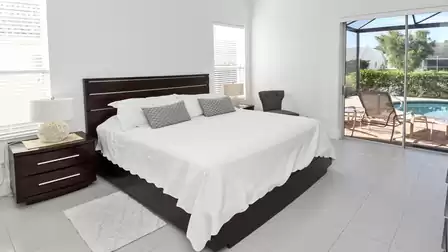 The master bedroom features a King size bed