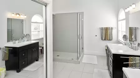 A private bathroom is connected en-suite to this bedroom