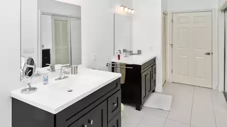 The master bath offers two separate sinks