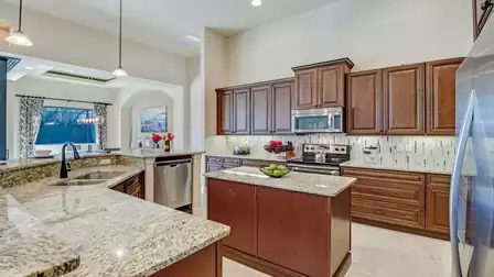 A spacious and modern kitchen invites you to cook