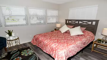 Guest bedroom with a queen size bed