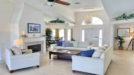 If you are cold in Florida, you can make yourself comfortable in front of the fireplace.