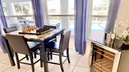 A game of chess with pool view
