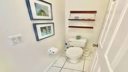 Modern guest bathroom decorated in white