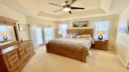 Bedroom with oversized double bed and access to the terrace