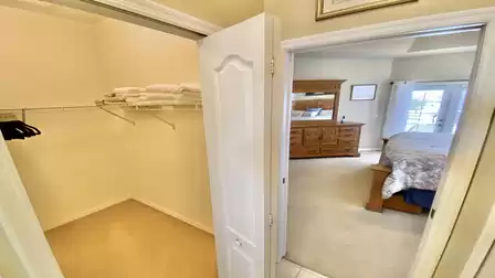 The walk-in closet has plenty of space for your shopping.