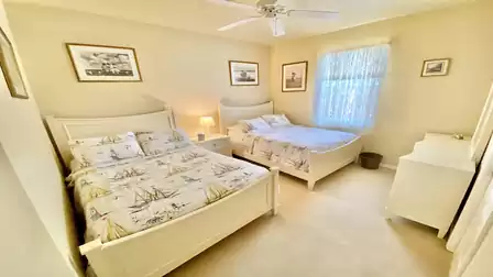Bright and friendly bedroom with 2 full size beds