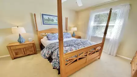 The 4th bedroom has a queen-size bed