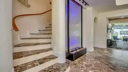 Illuminated waterfall in the living hall