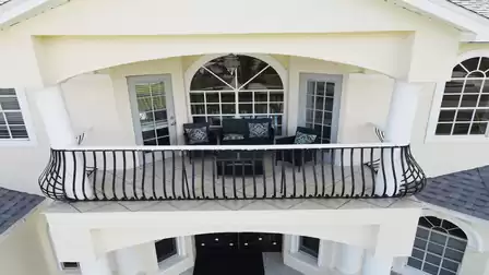 Balcony with seating above the entrance area