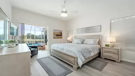 From this gorgeous bedroom, with King size bed, you can jump right into the pool