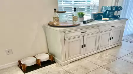 Buffet cabinet with coffee station and dog bowls