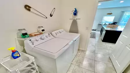 Laundry room with washer and dryer