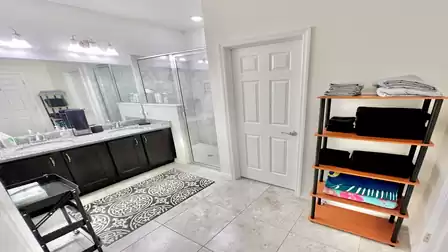 Spacious bathroom with double sinks.