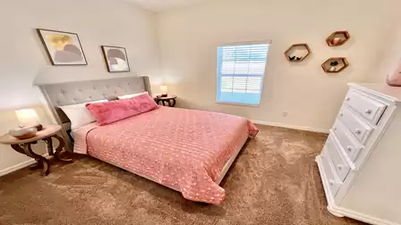 Cozy bedroom with pink accents