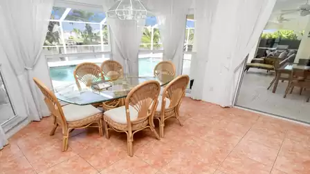 From the dining area you have a wonderful view of the pool and the canal