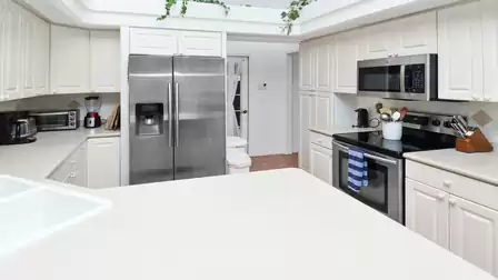 The kitchen offers a large work surface for creating delicious treats