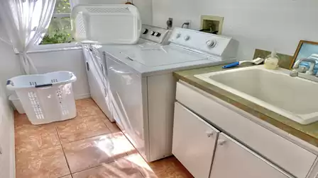 The utility room with washer and dryer