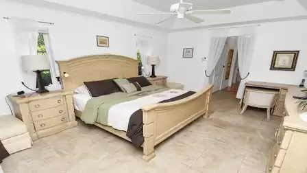 The oversized double bed in the master bedroom - sleeping comfort included