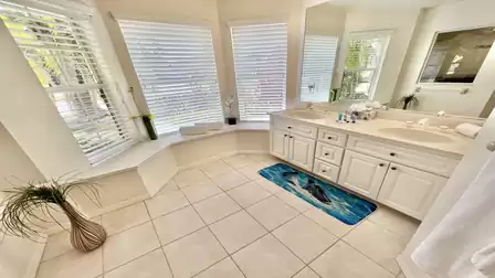 The adjoining bathroom—an oasis of relaxation first thing in the morning. 