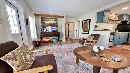living room with view into the kitchen 