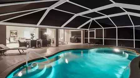 Evening-lit terrace and pool