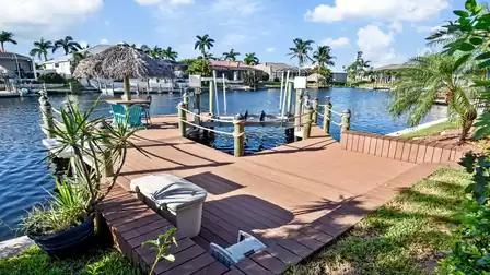 Large terrace on the canal with dock and boat lift