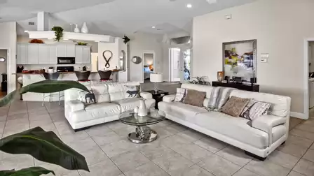 The living area captivates with simple elegance