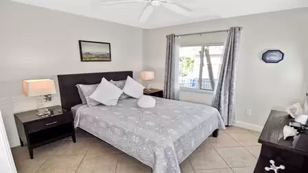 The 3rd bedroom with a view of the garden is also bright and flooded with light