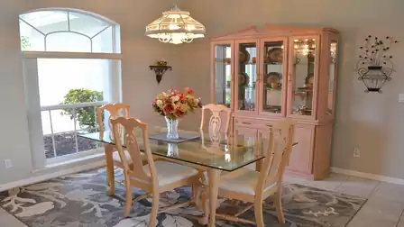 The dining area with a view of the front garden