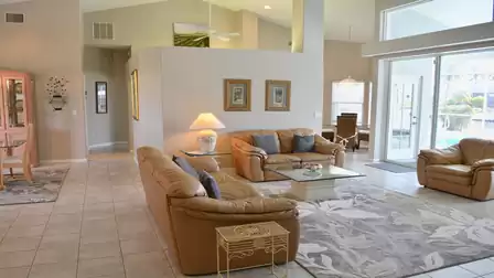 Living area with view of the pool