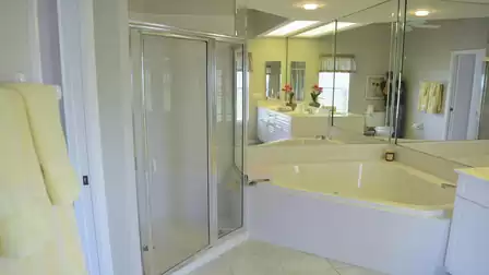 Shower and bathtub are also available