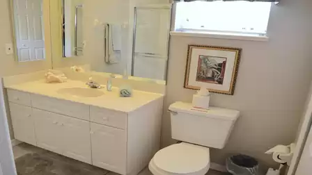The 2nd bathroom with sink and toilet