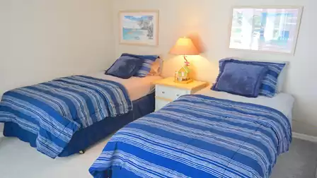 Two single beds in the 3rd bedroom