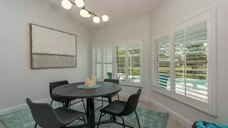 Modern dining area with a view of the terrace