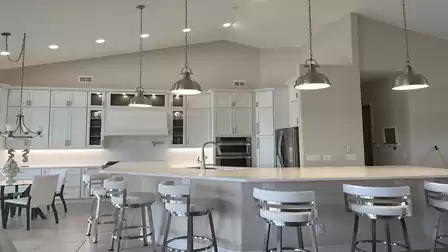 View of the modern, all-white kitchen