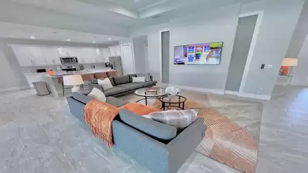 Grey and orange - harmonizing contrasts in the living room