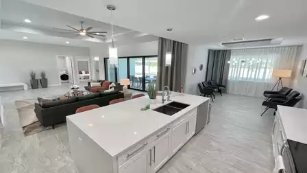 The living, dining and kitchen area at a glance - the dining table was still missing at the time