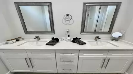chic - the modern bathroom belonging to the master bedroom