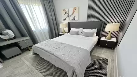 Modern ambience in this bedroom too