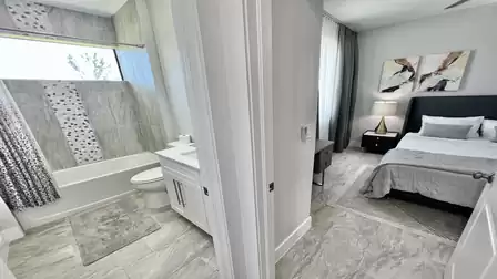 View into the bathroom belonging to the 2nd bedroom