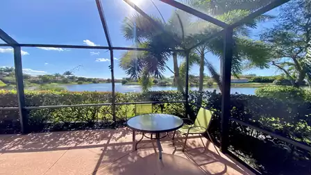 Sitting area in the shade of the palm tree